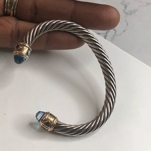 David Yurman renaissance 7mm with blue topaz bracelet with 14 karat gold